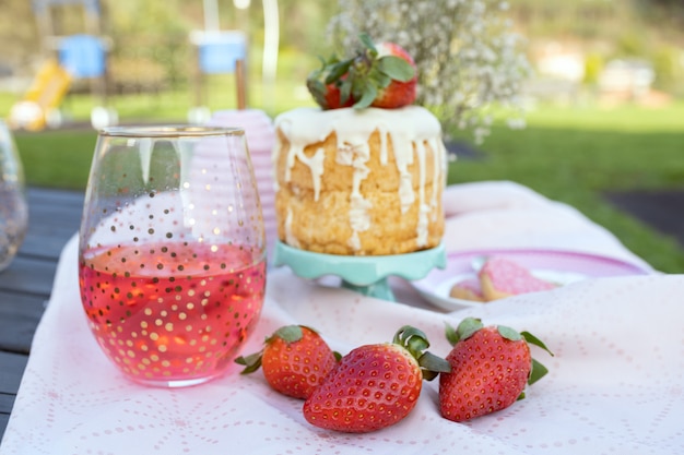 Picnic on wooden table in the park