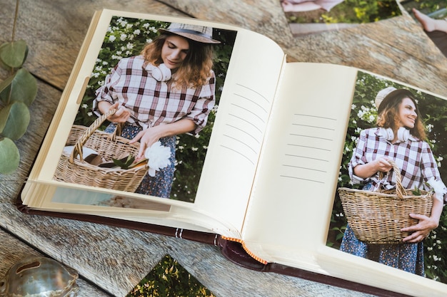 Photo picture album with printed photos on table print store concept