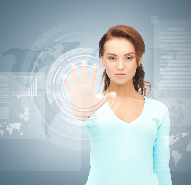 picture of attractive businesswoman touching virtual screen