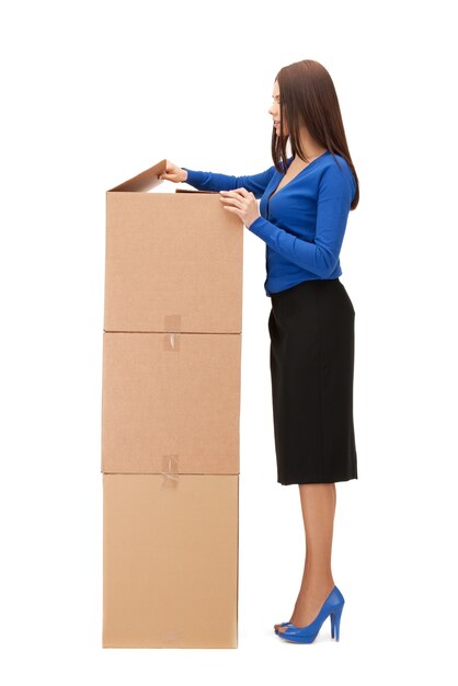 picture of attractive businesswoman with big boxes