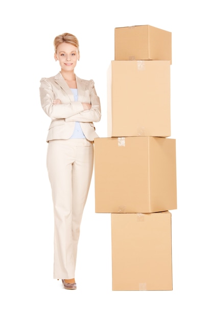 picture of attractive businesswoman with big boxes