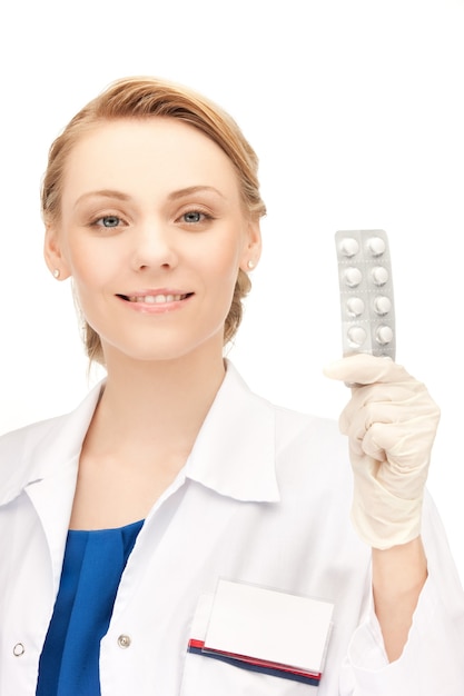 picture of attractive female doctor with pills