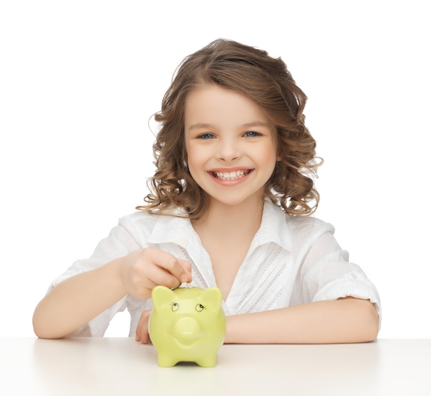 picture of beautiful girl with piggy bank