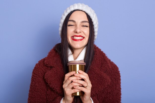 Picture of beautiful smiling young woman with bright red lips