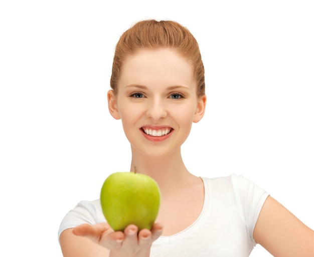 picture of beautiful teenage girl with green apple.