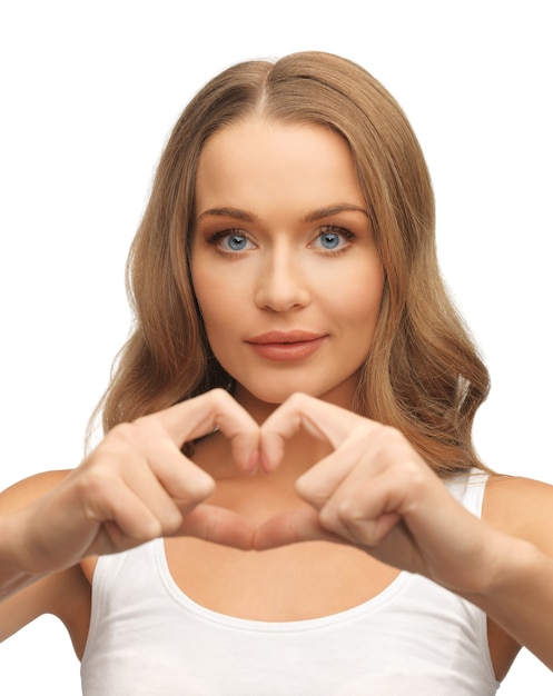 picture of beautiful woman forming heart shape