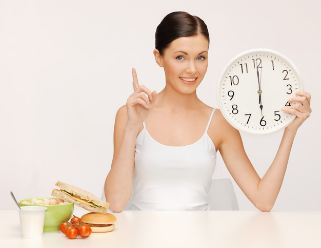 picture of beautiful woman with big clock