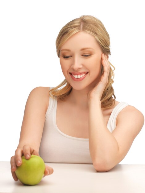 picture of beautiful woman with green apple.