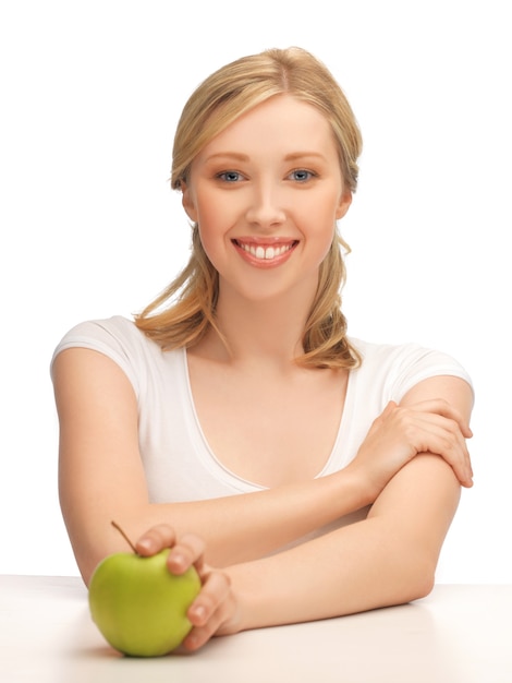 picture of beautiful woman with green apple.