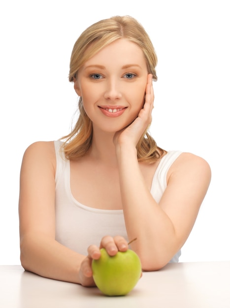 picture of beautiful woman with green apple.