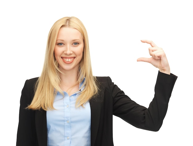 picture of beautiful young businesswoman holding something imaginary