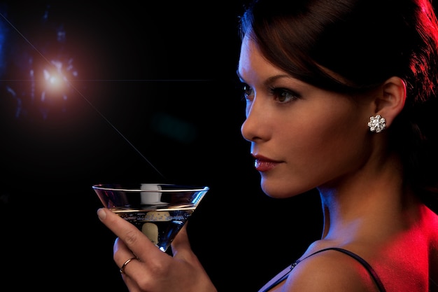 picture of beautiful young woman with a cocktail