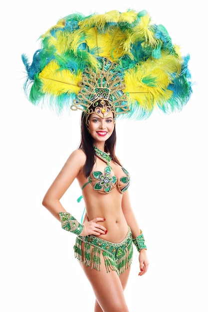 Picture of brazilian woman posing in samba costume on white