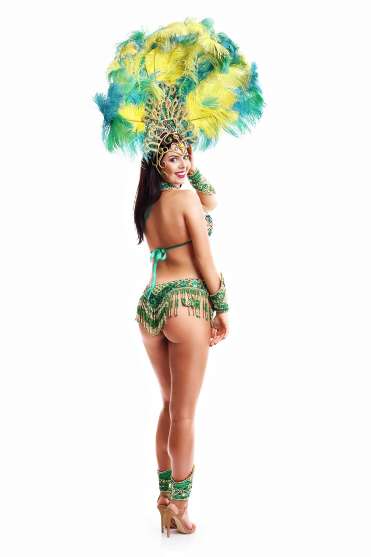 Picture of brazilian woman posing in samba costume on white