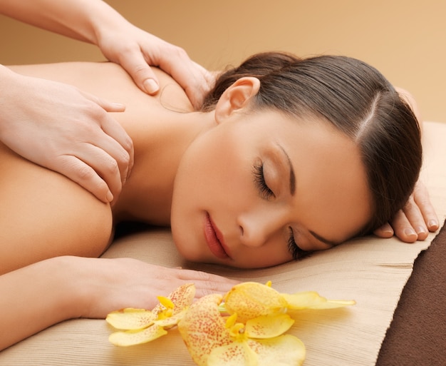 picture of calm beautiful woman in massage salon