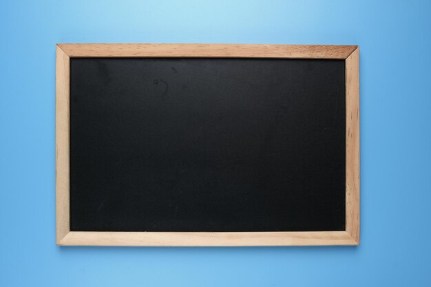 A picture of copyspace blackboard on blue background