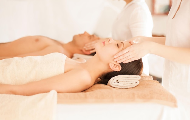 picture of couple in spa salon getting face treatment