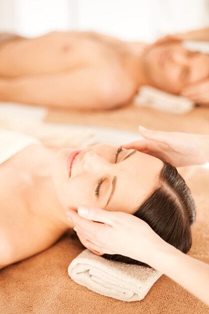 picture of couple in spa salon getting face treatment