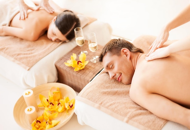 Premium Photo | Picture of couple in spa salon getting massage