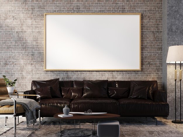 a picture frame hanging on a brick wall with a brown leather sofa