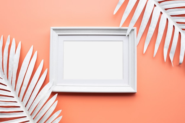 Picture frame with white tropical leaf