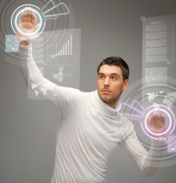 picture of futuristic man working with virtual screens