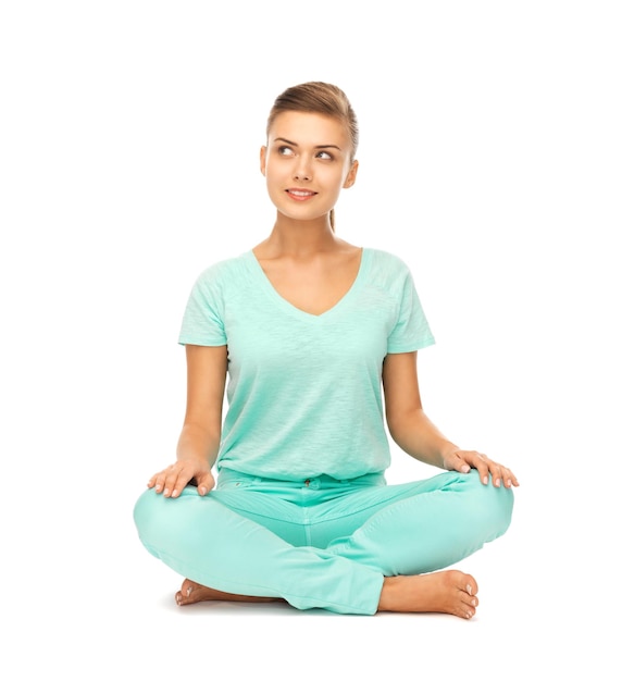 picture of girl sitting in lotus position and meditating