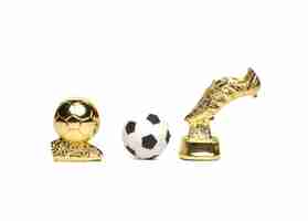 Photo a picture of golden boots golden ball and football on white background