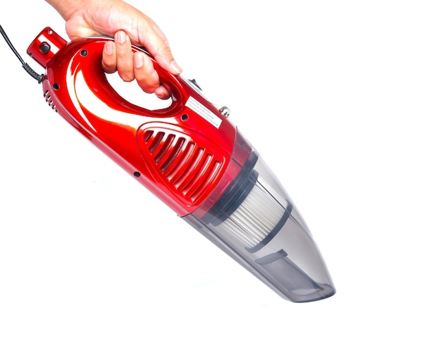 Photo a picture of hand holding red 2 in 1 pushrod type 800w portable handheld vacuum household cleaner on white background