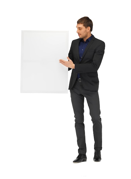 picture of handsome man in suit with a blank board.