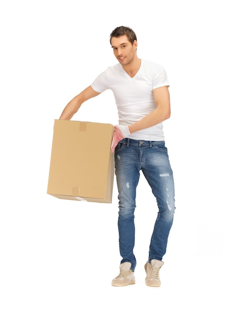 Photo picture of handsome man with big box.