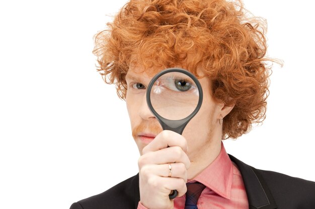 picture of handsome man with magnifying glass