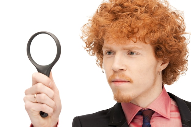 picture of handsome man with magnifying glass