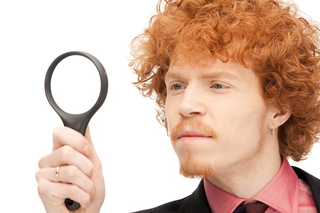 picture of handsome man with magnifying glass