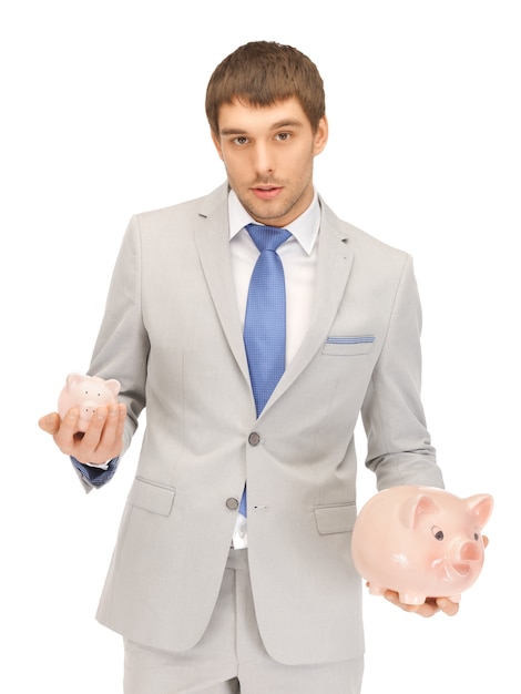 picture of handsome man with piggy bank