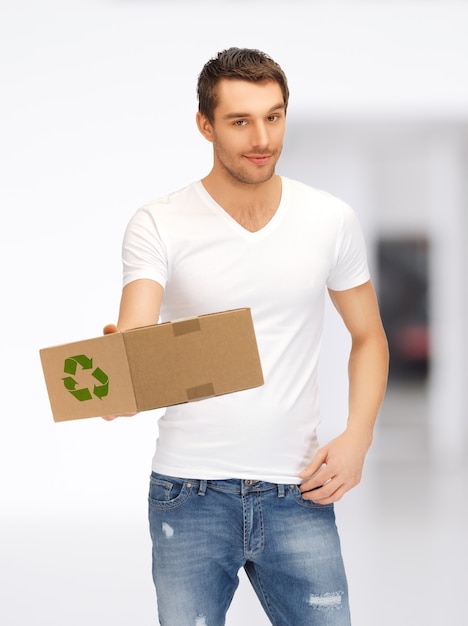 picture of handsome man with recyclable box