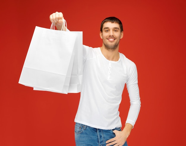 picture of handsome man with shopping bags