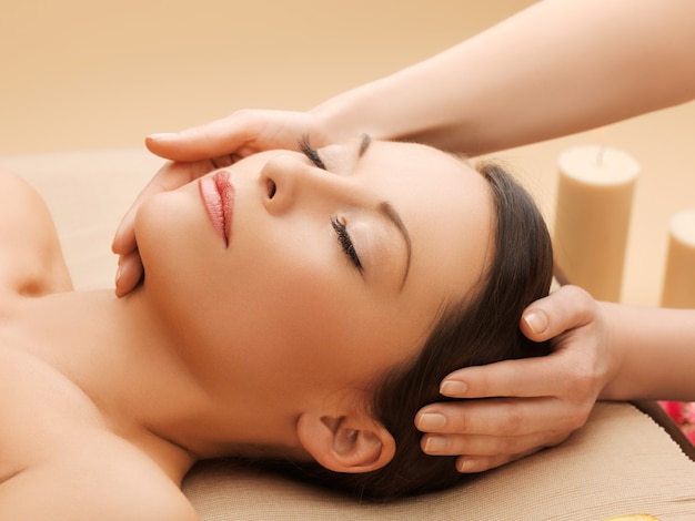 picture of happy beautiful woman in massage salon