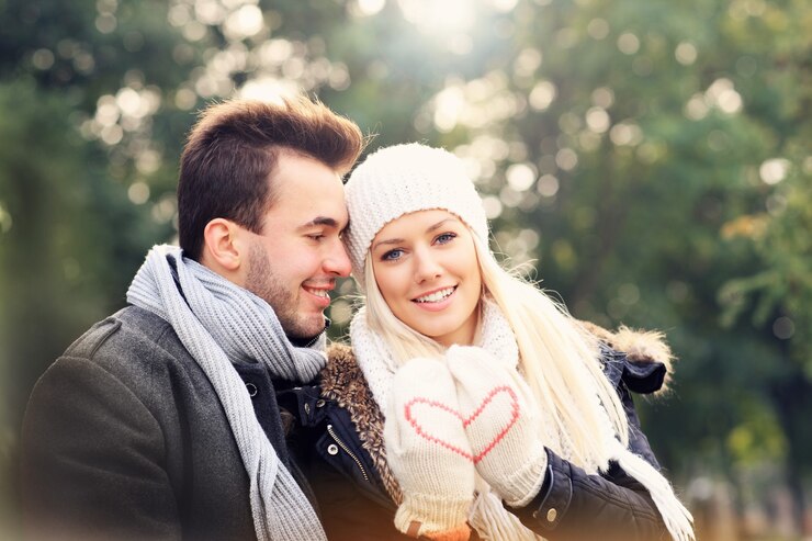 A picture of a happy couple on a date in the park