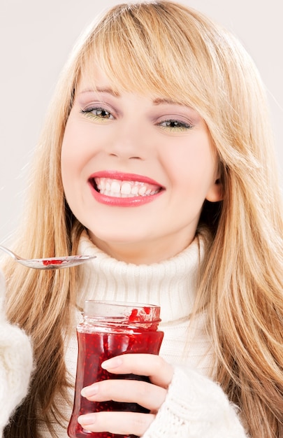 picture of happy girl with raspberry jam