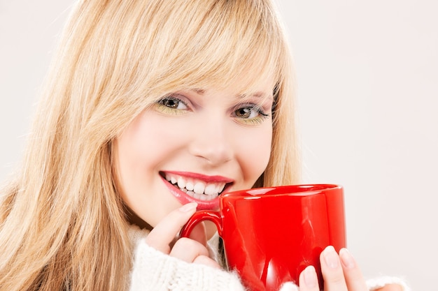 picture of happy girl with red mug