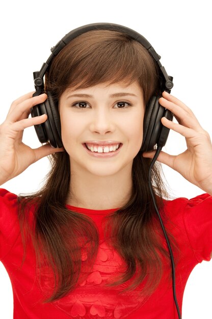 picture of happy teenage girl in big headphones