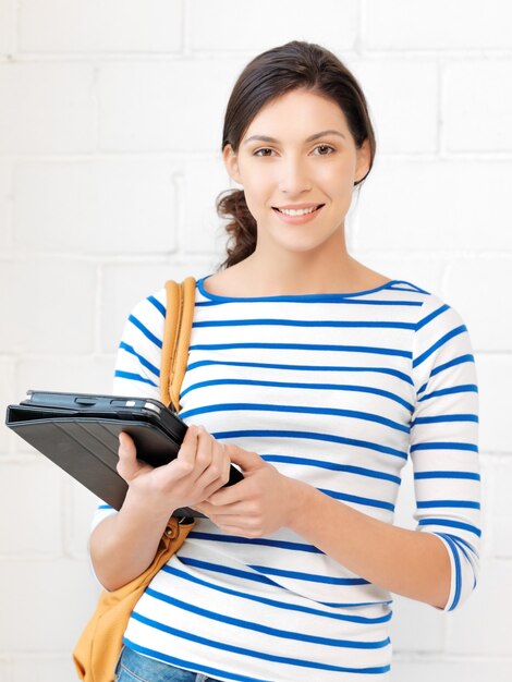 picture of happy teenage girl with tablet pc computer