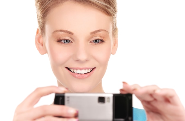 Photo picture of happy woman using phone camera