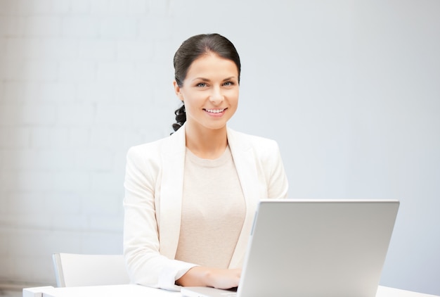 picture of happy woman with laptop computer