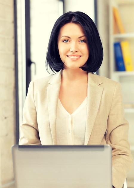 picture of happy woman with laptop computer