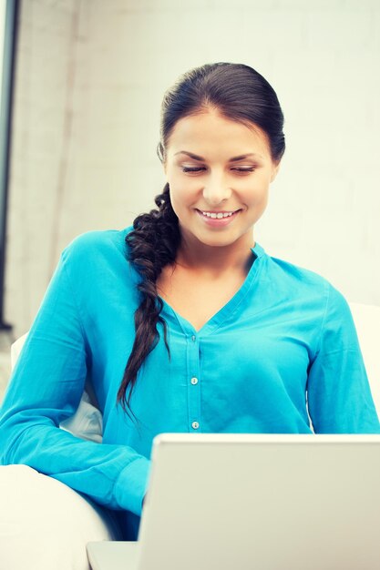 picture of happy woman with laptop computer.