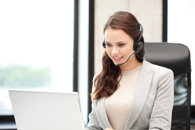 picture of helpline operator with laptop computer