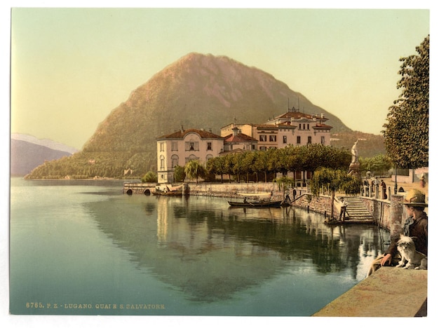 a picture of a lake with a mountain in the background