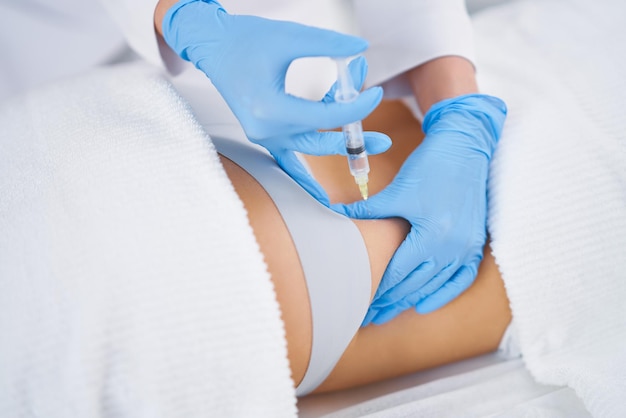 Picture of lipolysis treatment on different parts of woman body